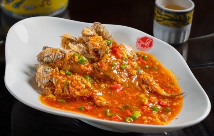 Whole crab in a fragrant chili and sweet pepper sauce