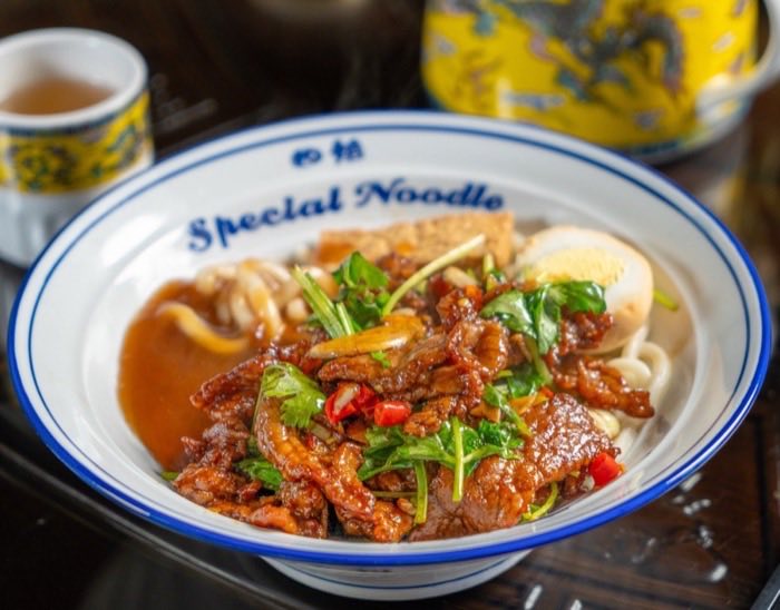A Special Noodle bowl of hand-pulled noodles with braised beef and egg